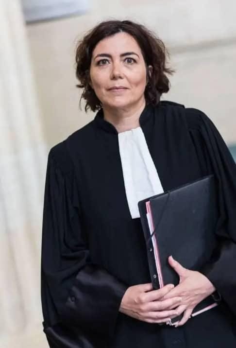 Michaele Beauer with a case file